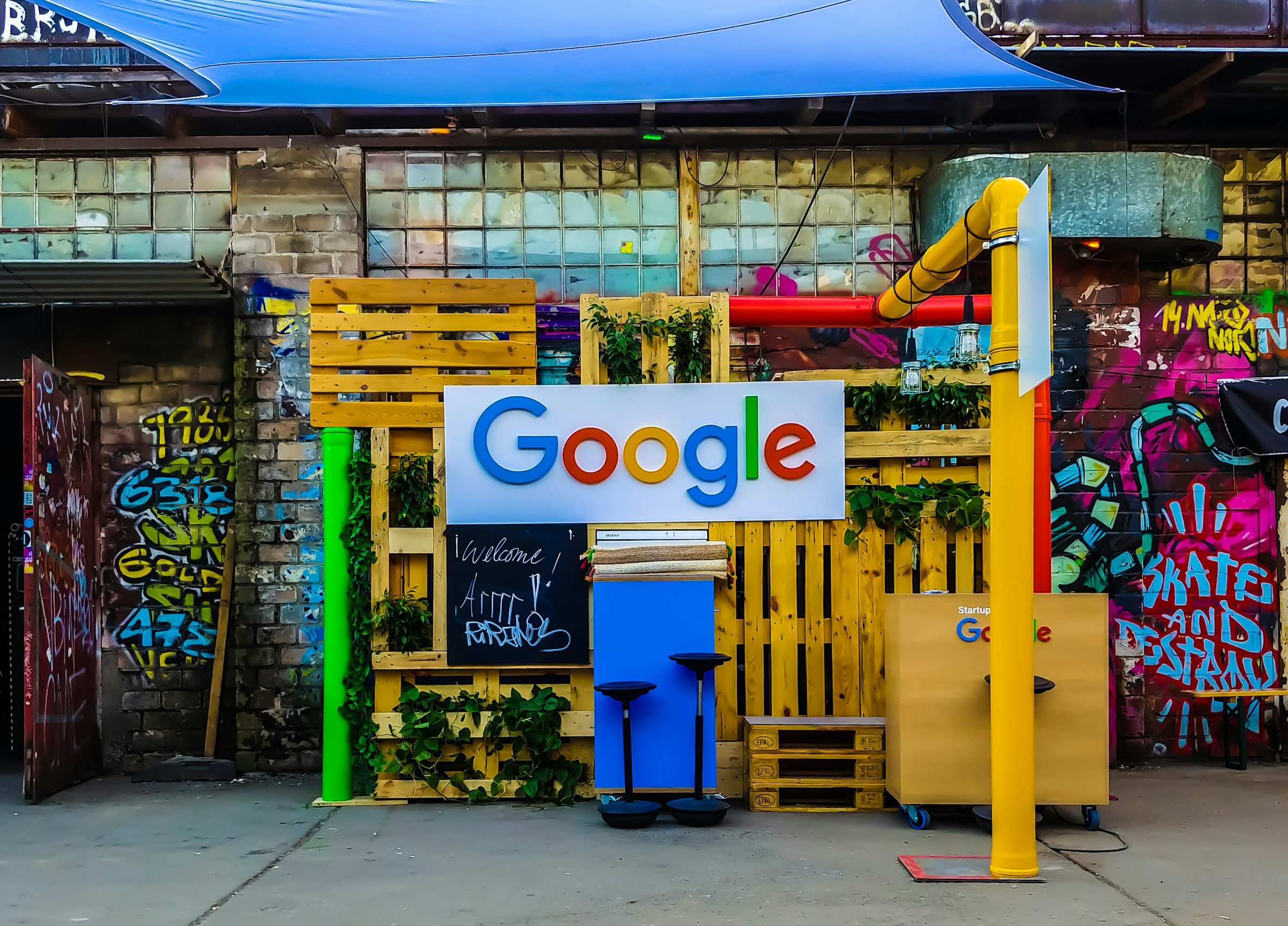 Google logo on wooden shop background