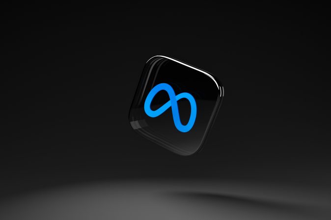 black background with blue floating meta logo